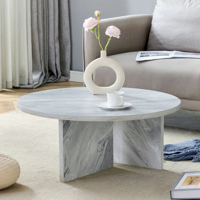 Versatile Round Coffee Table For Various Interior Styles